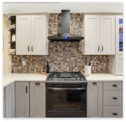 Fully remodeled kitchen with white cabinets